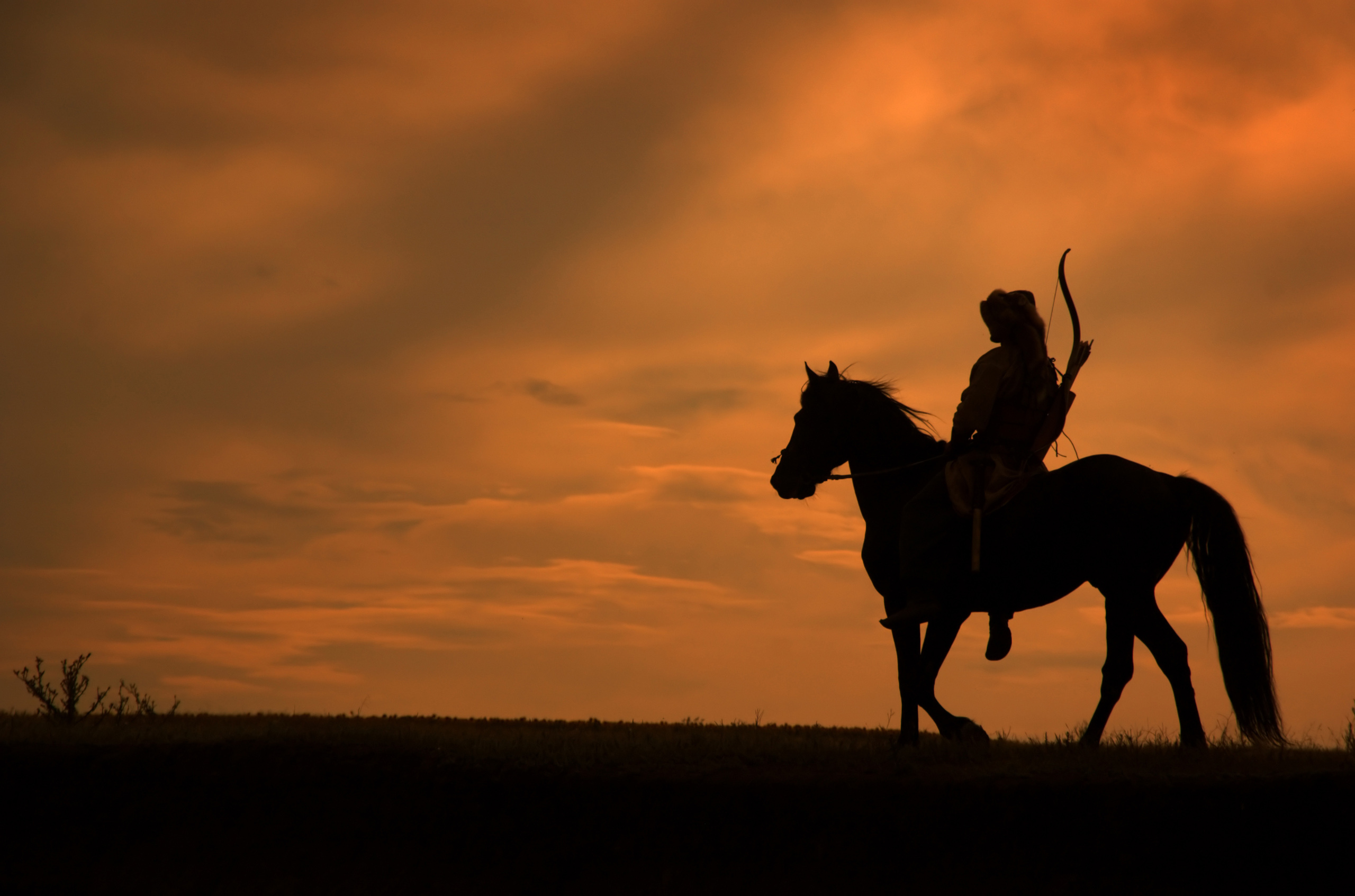 Horsemen,Riding,On,The,Sunset